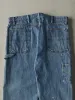 Vintage 90s Mid Wash Rustler Carpenter Jeans (38x32) sold by Rebalance Vintage