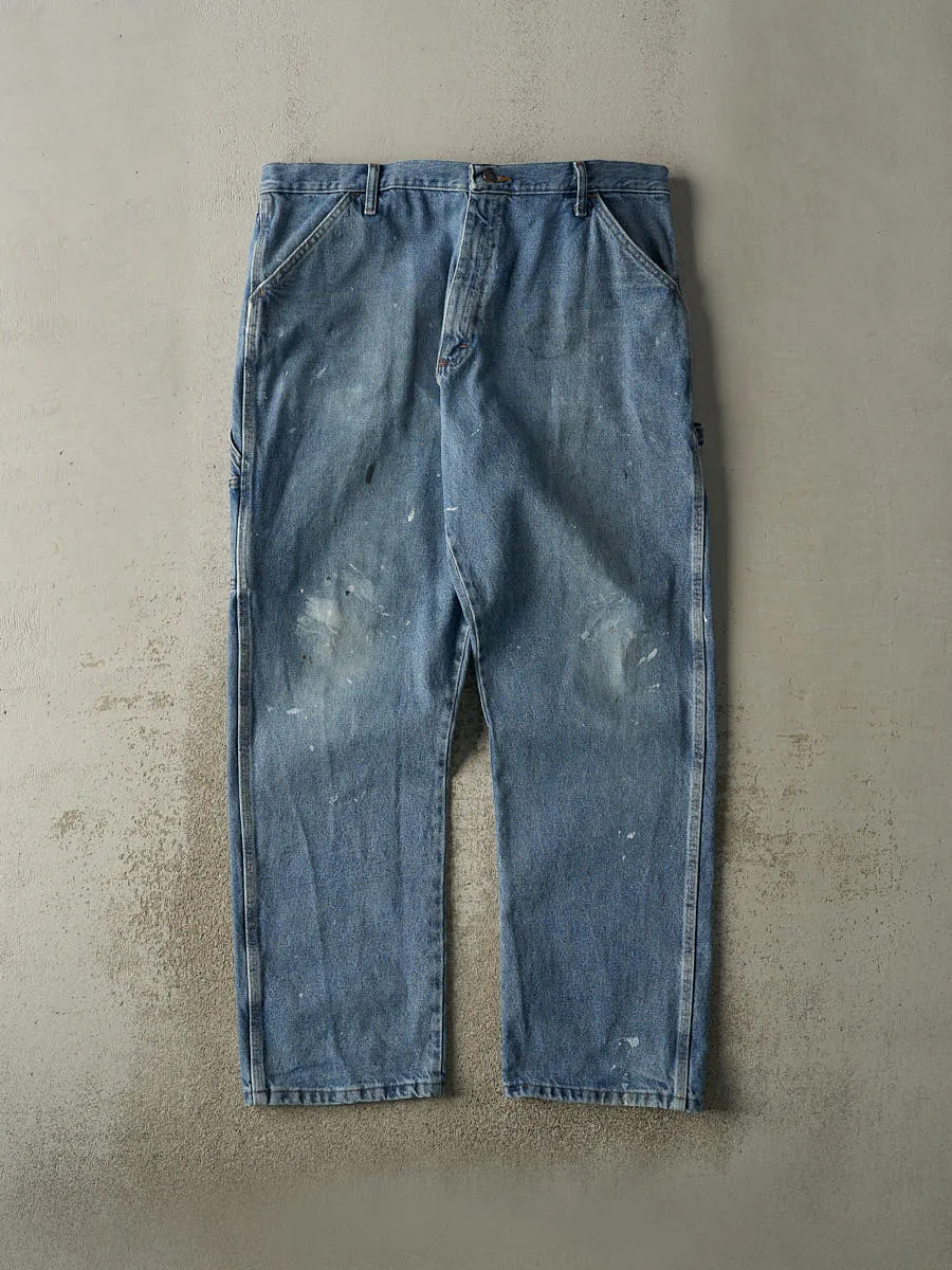 Vintage 90s Mid Wash Rustler Carpenter Jeans (38x32) sold by Rebalance Vintage