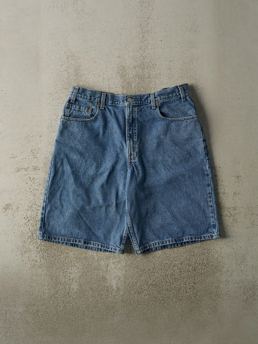 Vintage 90s Mid Wash Levi's 560 Jean Shorts (35.5x11) sold by Rebalance Vintage