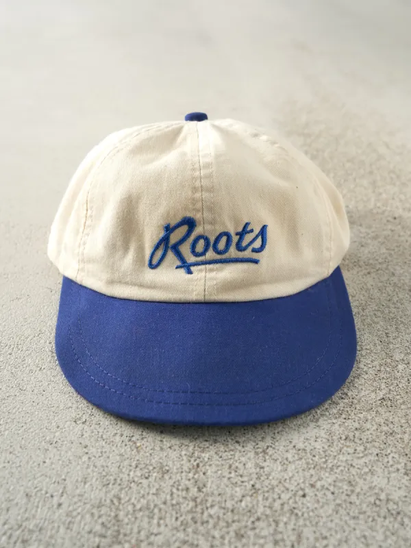 Vintage 90s Beige & Blue Embroidered Roots Leather Strap Back Hat sold by Rebalance Vintage