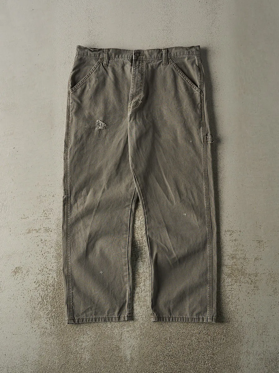 Vintage 90s Green Rustler Carpenter Pants (34x28) sold by Rebalance Vintage
