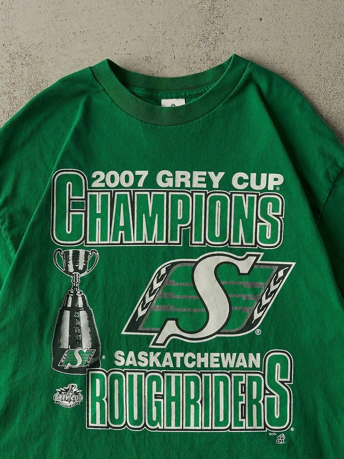 Vintage 07' Green Saskatchewan Rough Riders Grey Cup Champions Tee (XL) sold by Rebalance Vintage product image thumbnail 2