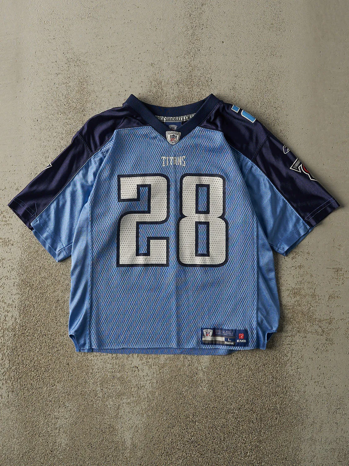 Vintage Y2K Blue Tennessee Titans #28 Chris Johnson Cropped Football Jersey (S/M) sold by Rebalance Vintage
