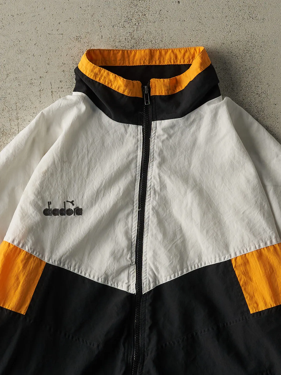 Vintage 90s White, Black & Yellow Diadora Boxy Track Jacket (XL) sold by Rebalance Vintage product image thumbnail 3