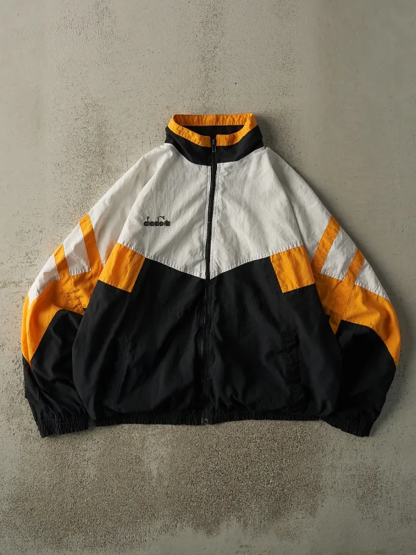 Vintage 90s White, Black & Yellow Diadora Boxy Track Jacket (XL) sold by Rebalance Vintage