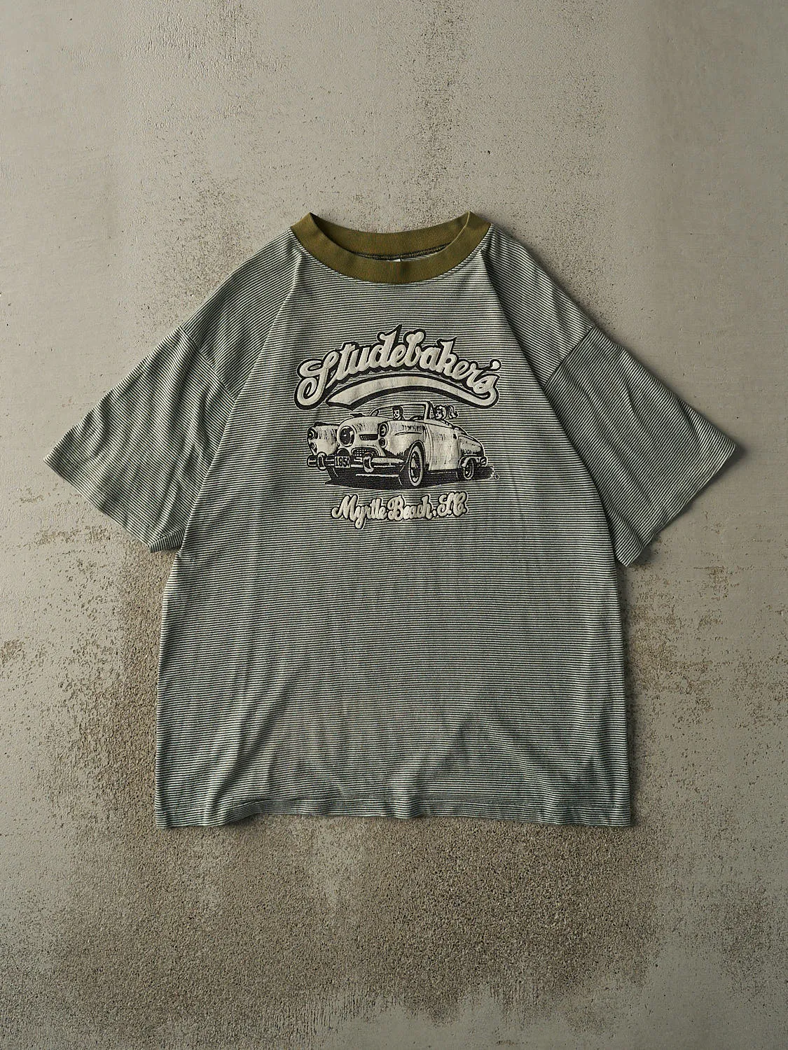 Vintage 90s Green Studebaker's Striped Tee (L/XL) sold by Rebalance Vintage
