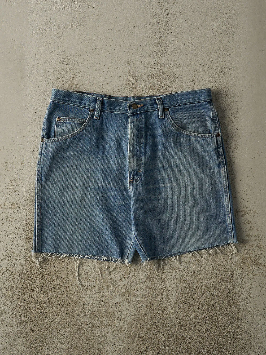 Vintage Y2K Mid Wash Wrangler Cut Off Jean Shorts (36x7.5) sold by Rebalance Vintage