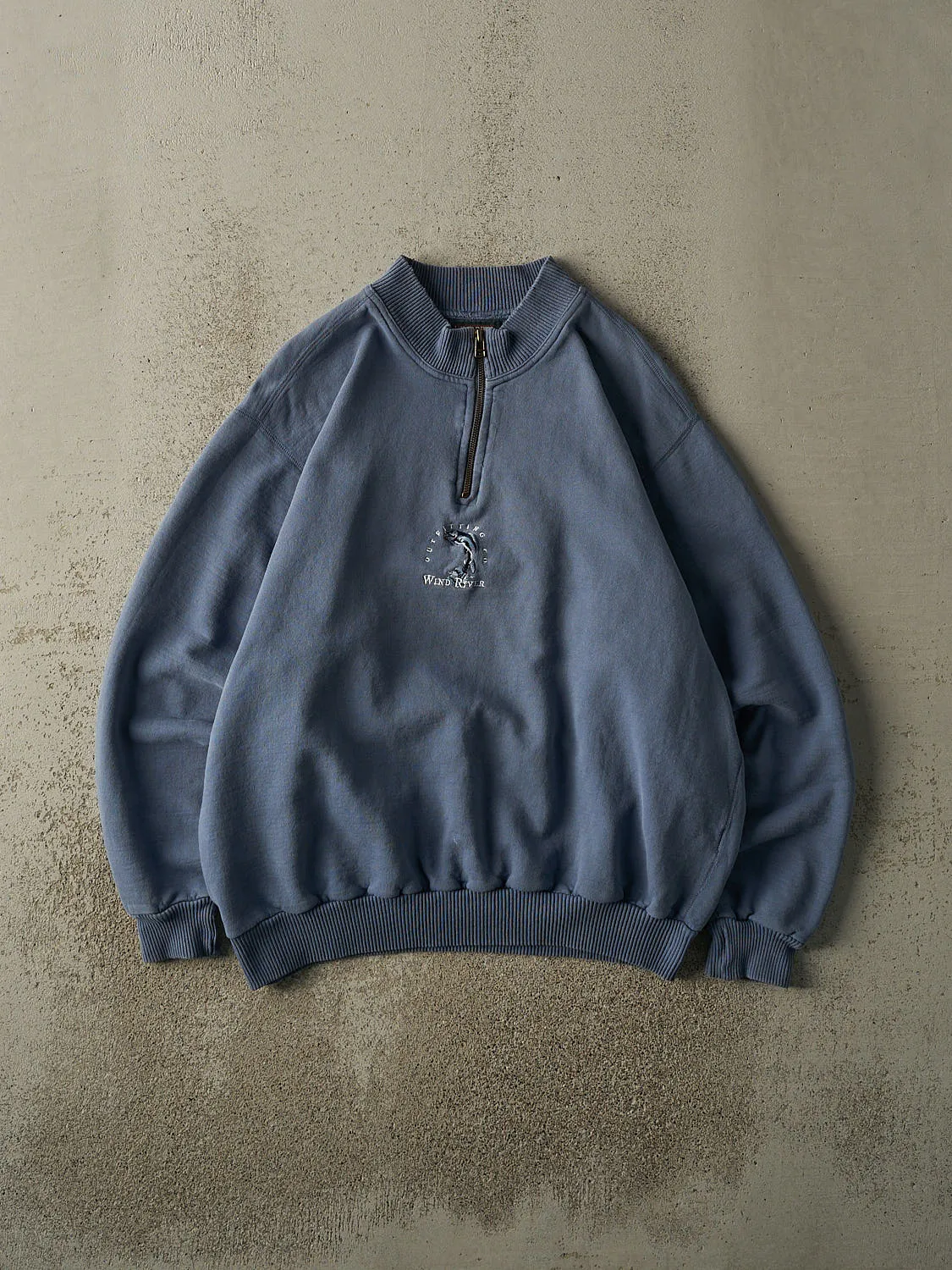 Vintage 90s Slate Blue Wind River Embroidered Quarter Zip Sweater (M/L) sold by Rebalance Vintage