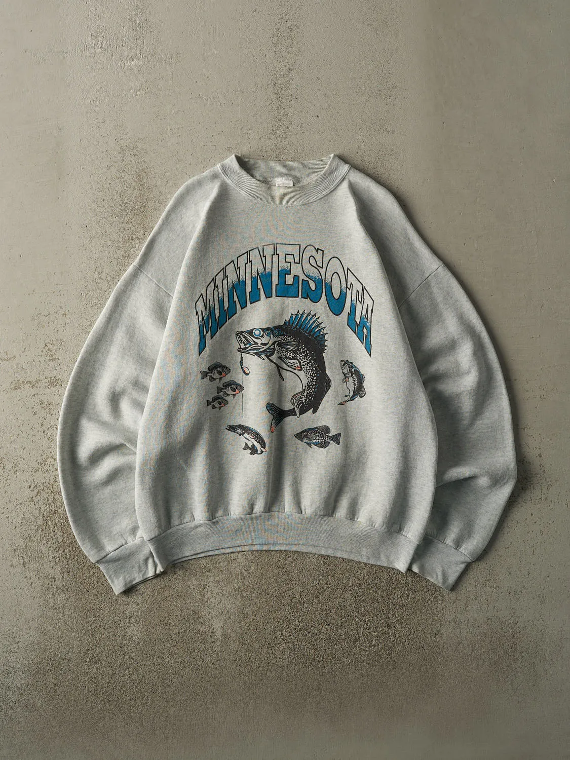 Vintage 90s Heather Grey Minnesota Crewneck (L/XL) sold by Rebalance Vintage