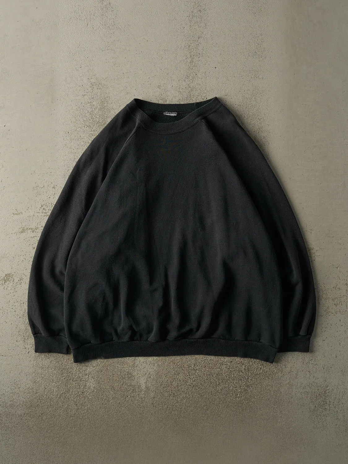 Vintage 90s Faded Black Blank Crewneck (XXL) sold by Rebalance Vintage