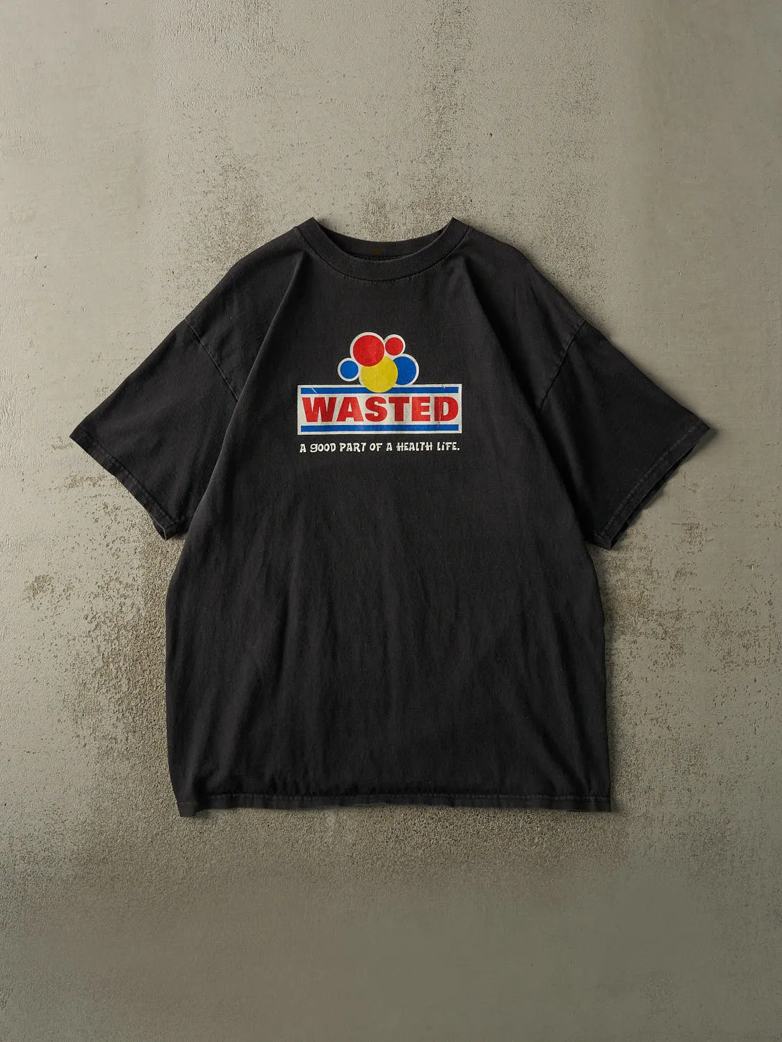 Vintage 90s Black "Wasted, A Good Part of A Health Life" Slogan Tee (XL/XXL) sold by Rebalance Vintage