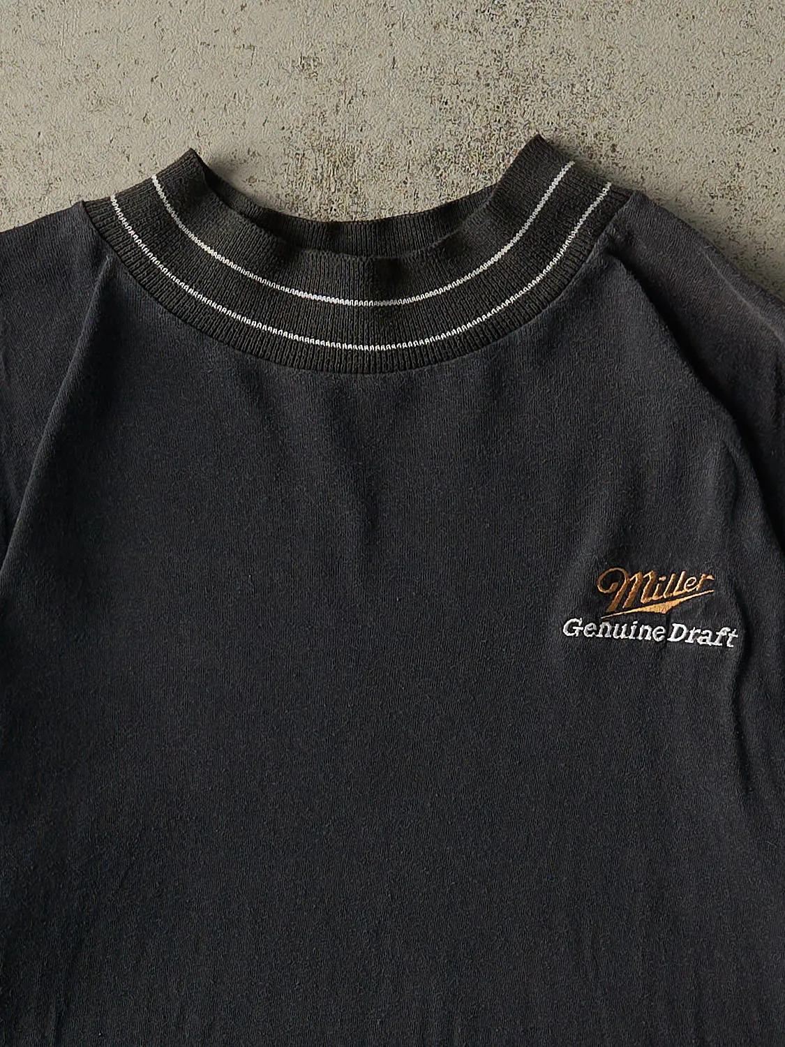 Vintage 90s Faded Black Miller Genuine Draft Embroidered Mock Neck Tee (XL) sold by Rebalance Vintage product image thumbnail 2