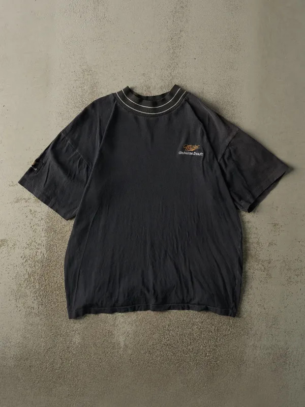 Vintage 90s Faded Black Miller Genuine Draft Embroidered Mock Neck Tee (XL) sold by Rebalance Vintage