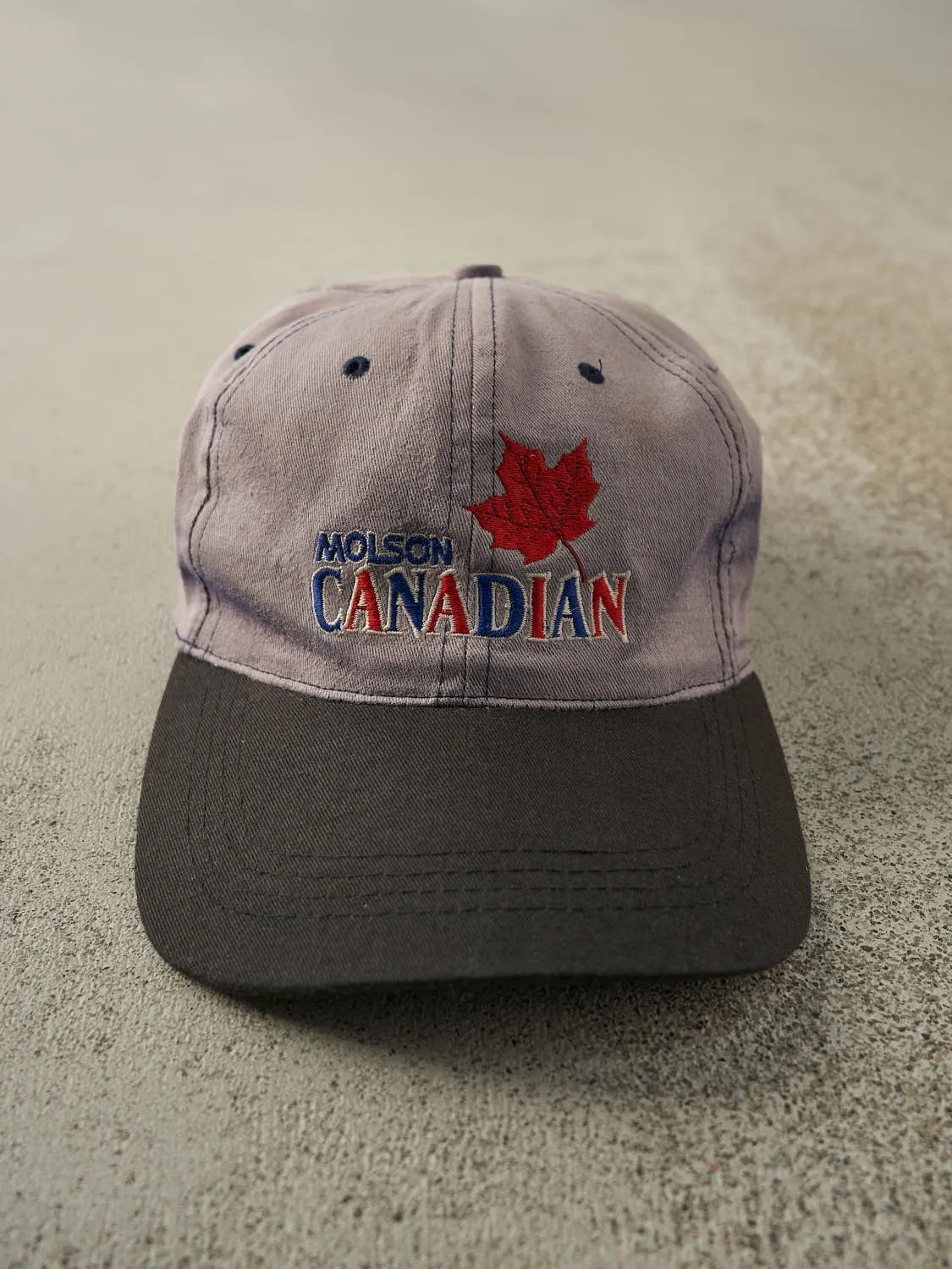 Vintage 90s Blue & Black Embroidered Molson Canadian Strapback sold by Rebalance Vintage