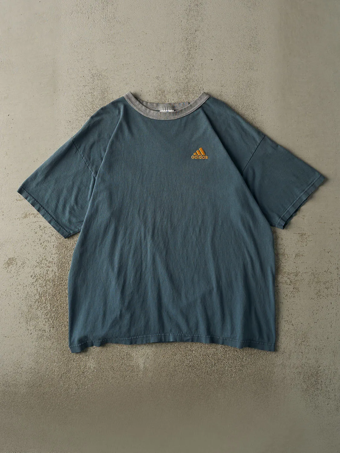 Vintage 90s Slate Blue Adidas Embroidered Logo Tee (XL) sold by Rebalance Vintage