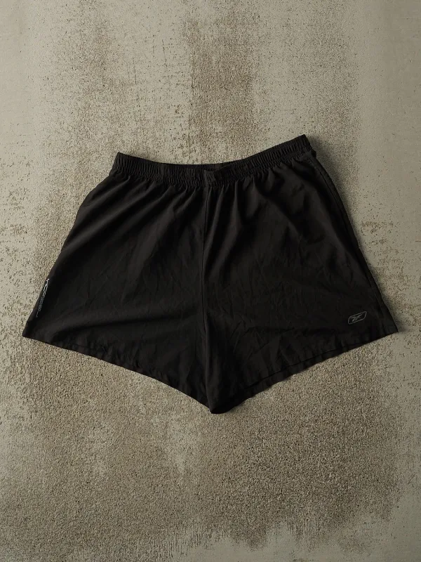 Vintage Y2K Black Reebok Track Shorts (28x4) sold by Rebalance Vintage