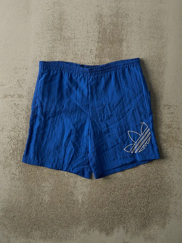 Vintage 90s Blue Adidas Embroidered Nylon Track Shorts (34x8) sold by Rebalance Vintage