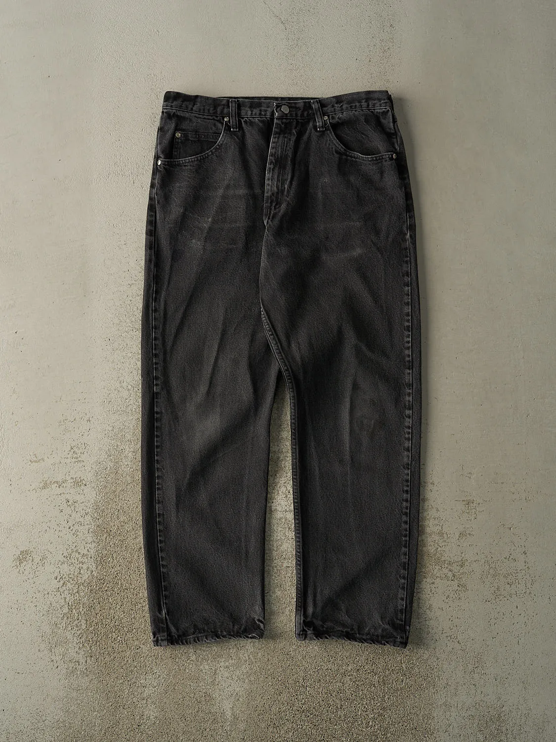 Vintage 90s Faded Black Wrangler Denim Pants (34x31) sold by Rebalance Vintage