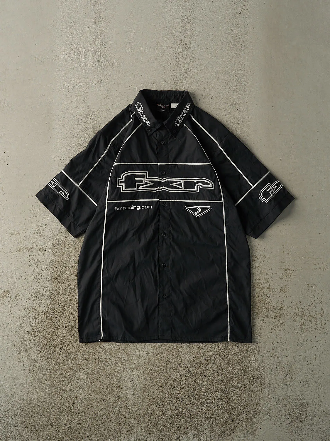 Vintage Y2K Black FXR Racing Embroidered Button Up Tee (M/L) sold by Rebalance Vintage
