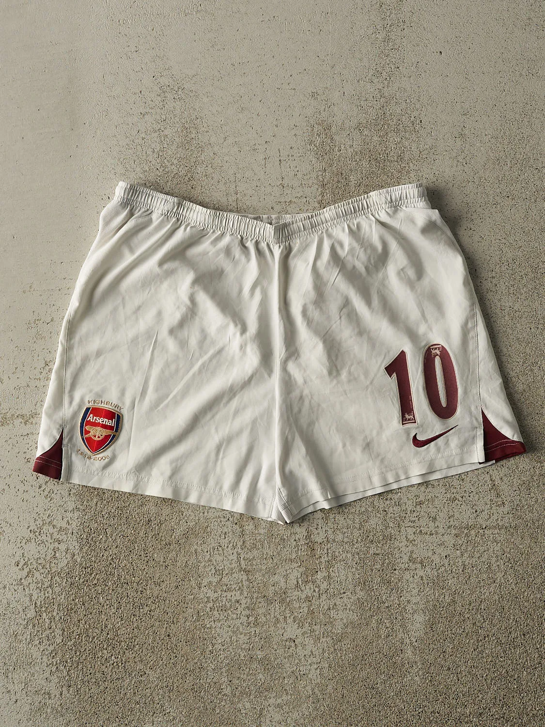 Vintage 06' White Nike x Arsenal #10 Track Shorts (32x5.5) sold by Rebalance Vintage