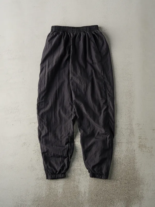 Vintage 90s Black Puma Tonal Embroidered Logo Windbreaker Pants (25x28.5) sold by Rebalance Vintage