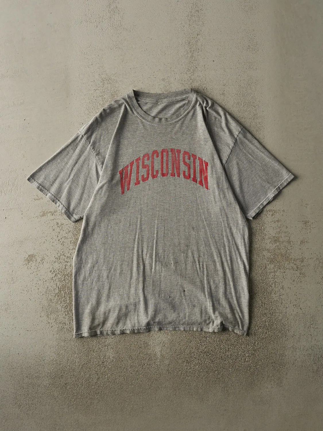 Vintage 90s Grey University of Wisconsin Tee (L/XL) sold by Rebalance Vintage