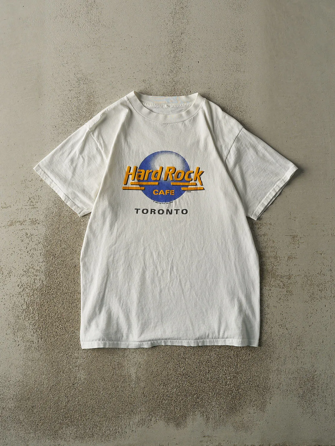 Vintage 89' White Hard Rock Cafe Toronto Puff Print Tee (M/L) sold by Rebalance Vintage