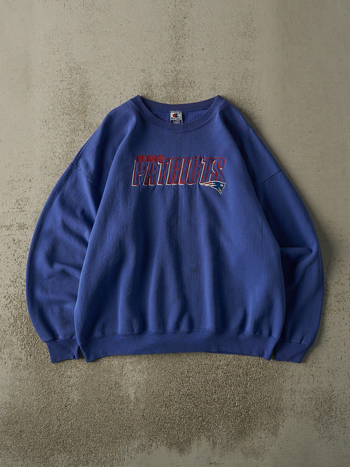 Vintage 90s Blue New England Patriots Embroidered Crewneck (L/XL) sold by Rebalance Vintage