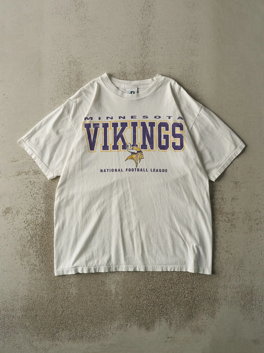 Vintage 90s White Minnesota Vikings Tee (L/XL) sold by Rebalance Vintage