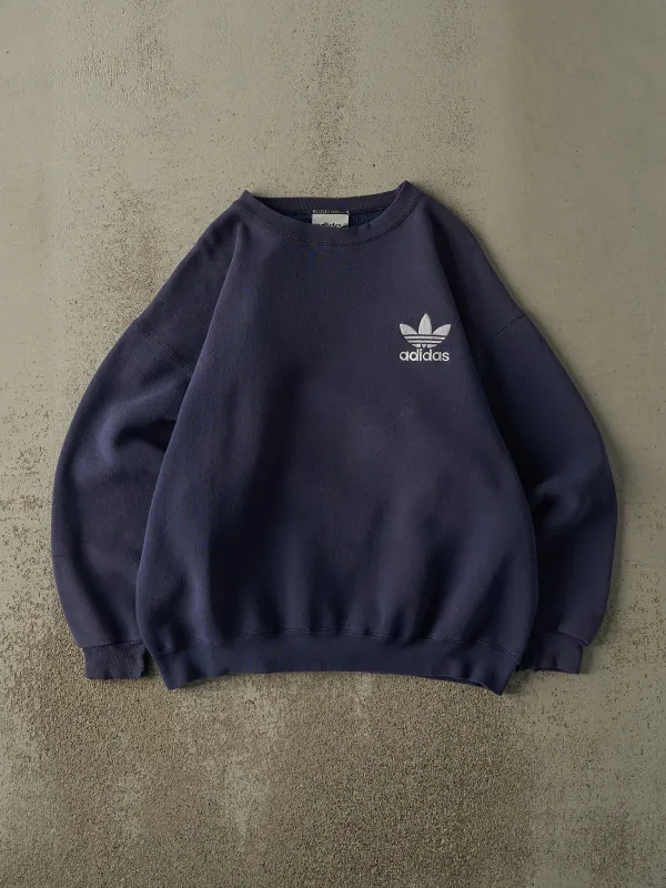 Vintage 90s Sun Faded Navy Blue Adidas Embroidered Crewneck (L/XL) sold by Rebalance Vintage