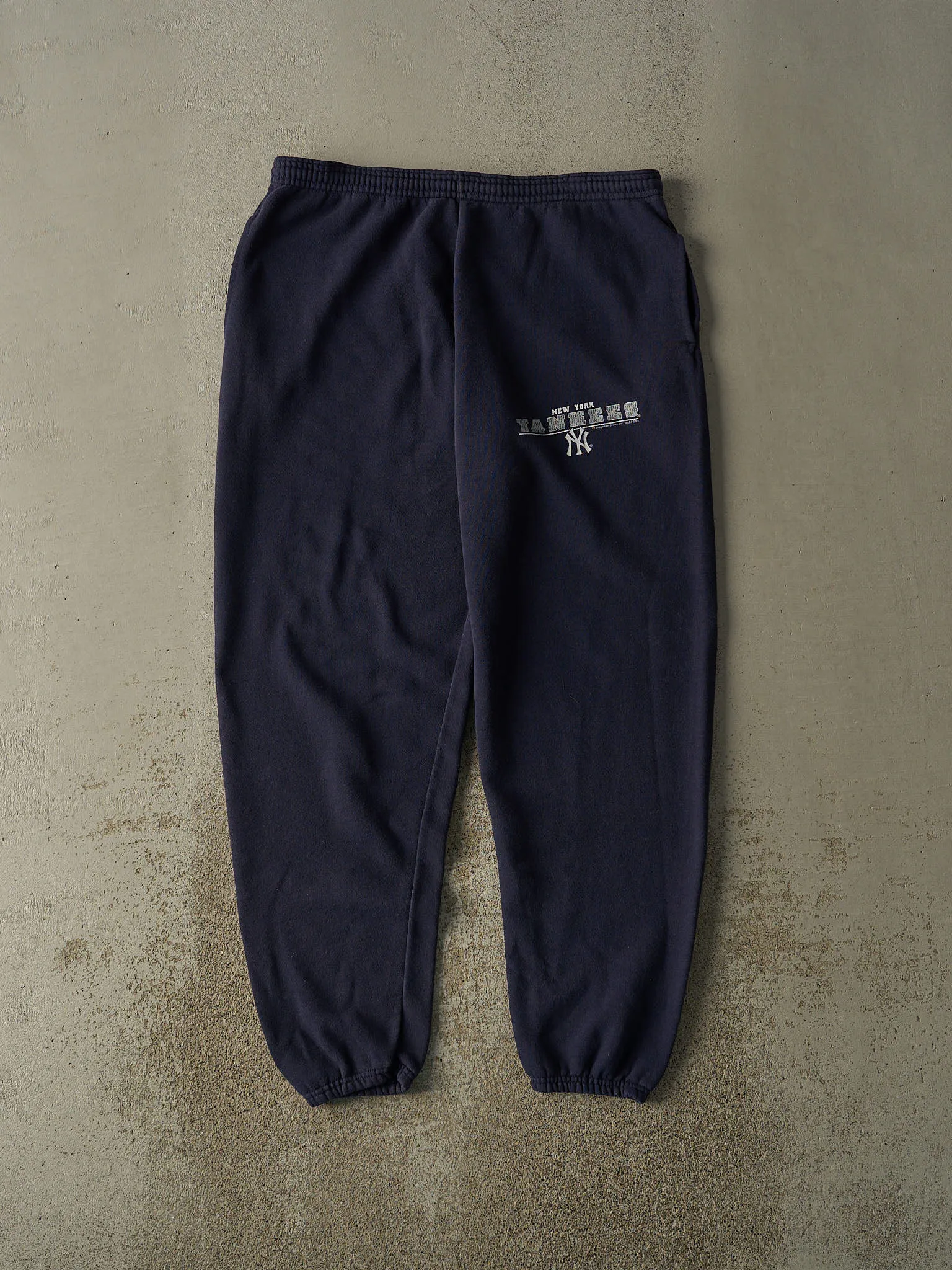 Vintage 01' Navy Blue New York Yankees Embroidered Sweatpants (34x29.5) sold by Rebalance Vintage