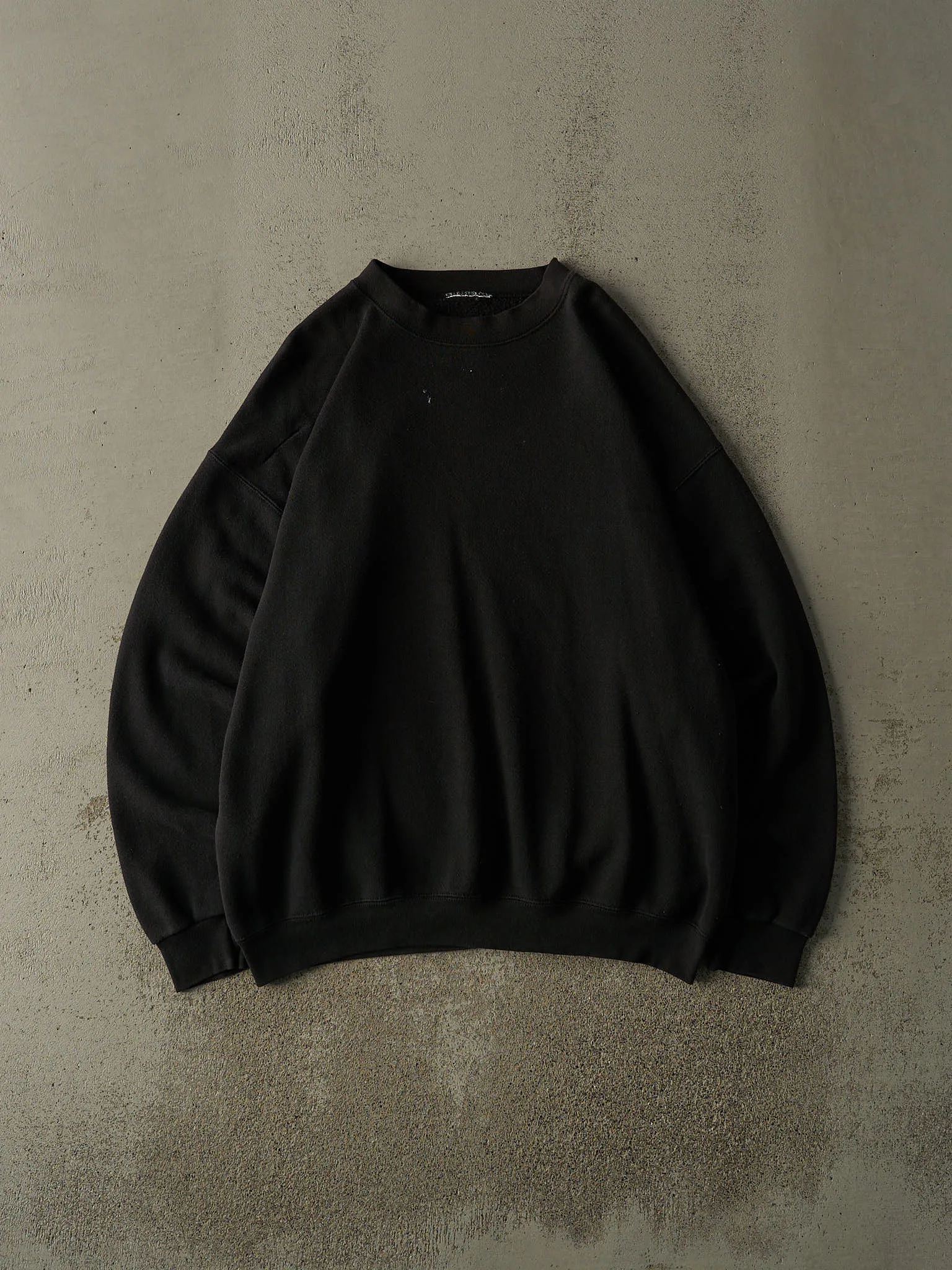 Vintage 90s Faded Black Blank Crewneck (XXL) sold by Rebalance Vintage