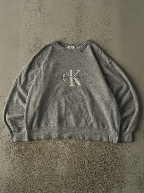 Vintage Y2K Grey Calvin Klein Jeans Boxy Crewneck (M/L) sold by Rebalance Vintage