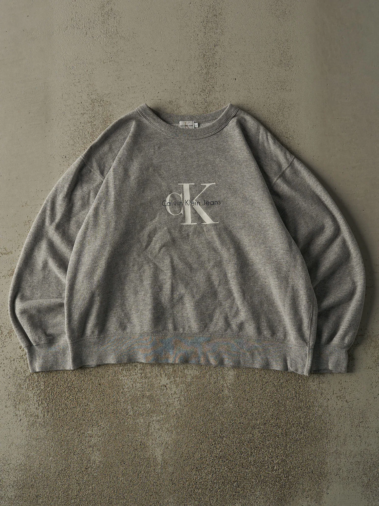 Vintage Y2K Grey Calvin Klein Jeans Boxy Crewneck (M/L) sold by Rebalance Vintage