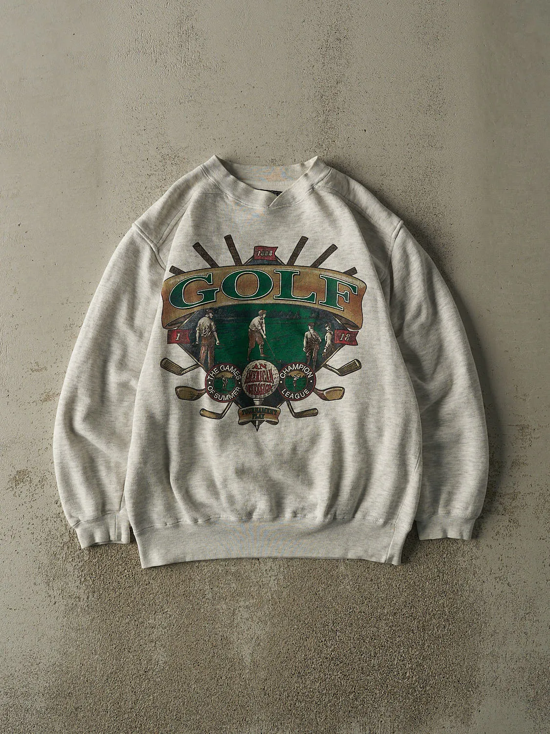 Vintage 90s Heather Grey Golf Crewneck (M/L) sold by Rebalance Vintage