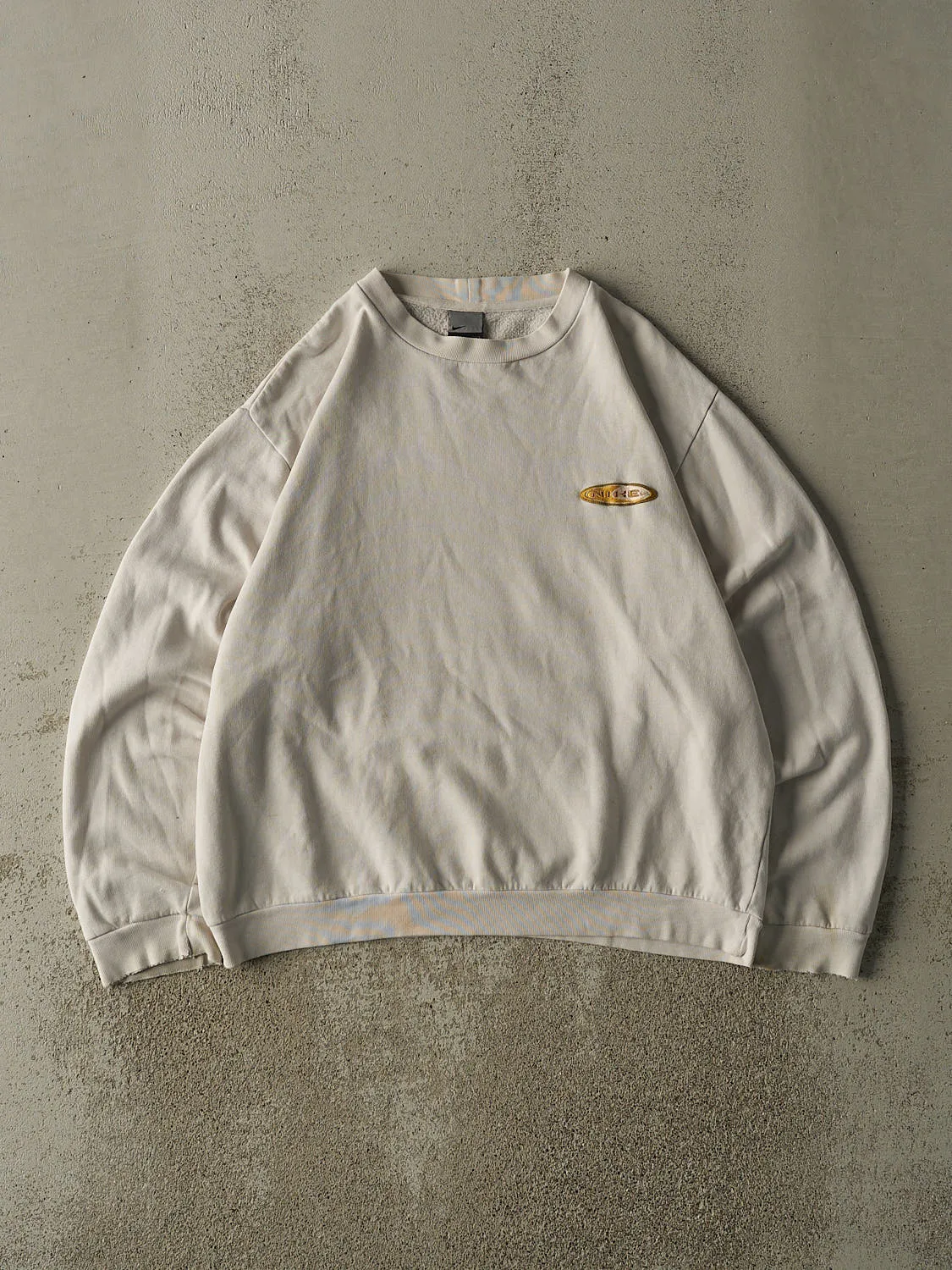 Vintage Y2K Beige Nike Embroidered Boxy Crewneck (M/L) sold by Rebalance Vintage