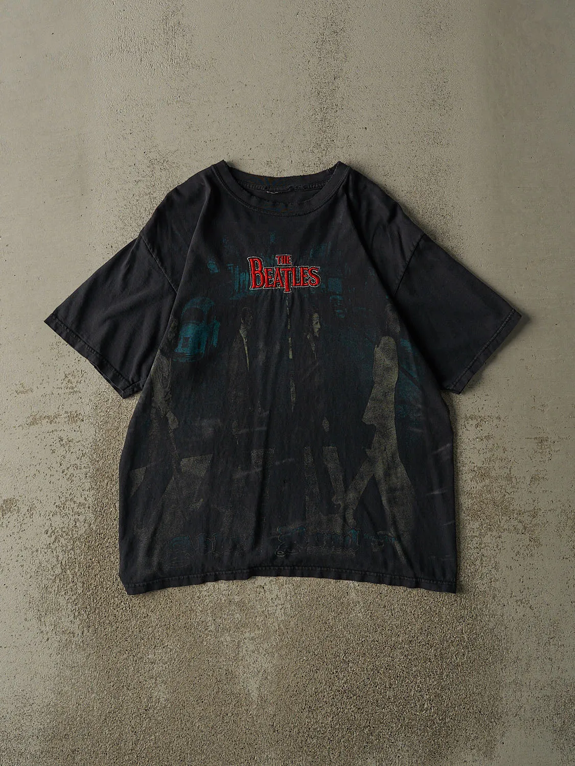 Vintage 90s Faded Black The Beatles Abbey Road Embroidered Tee (M/L) sold by Rebalance Vintage