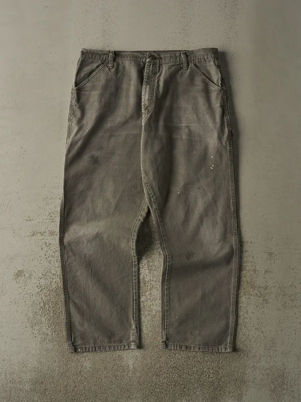 Vintage 90s Faded Green Rustler Carpenter Pants (38x30) sold by Rebalance Vintage