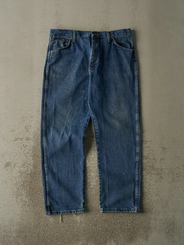 Vintage 80s Mid Wash Wrangler Jeans (35x30) sold by Rebalance Vintage