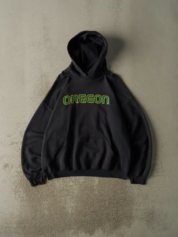 Vintage 90s Sun Faded Black University of Oregon Hoodie (L/XL) sold by Rebalance Vintage