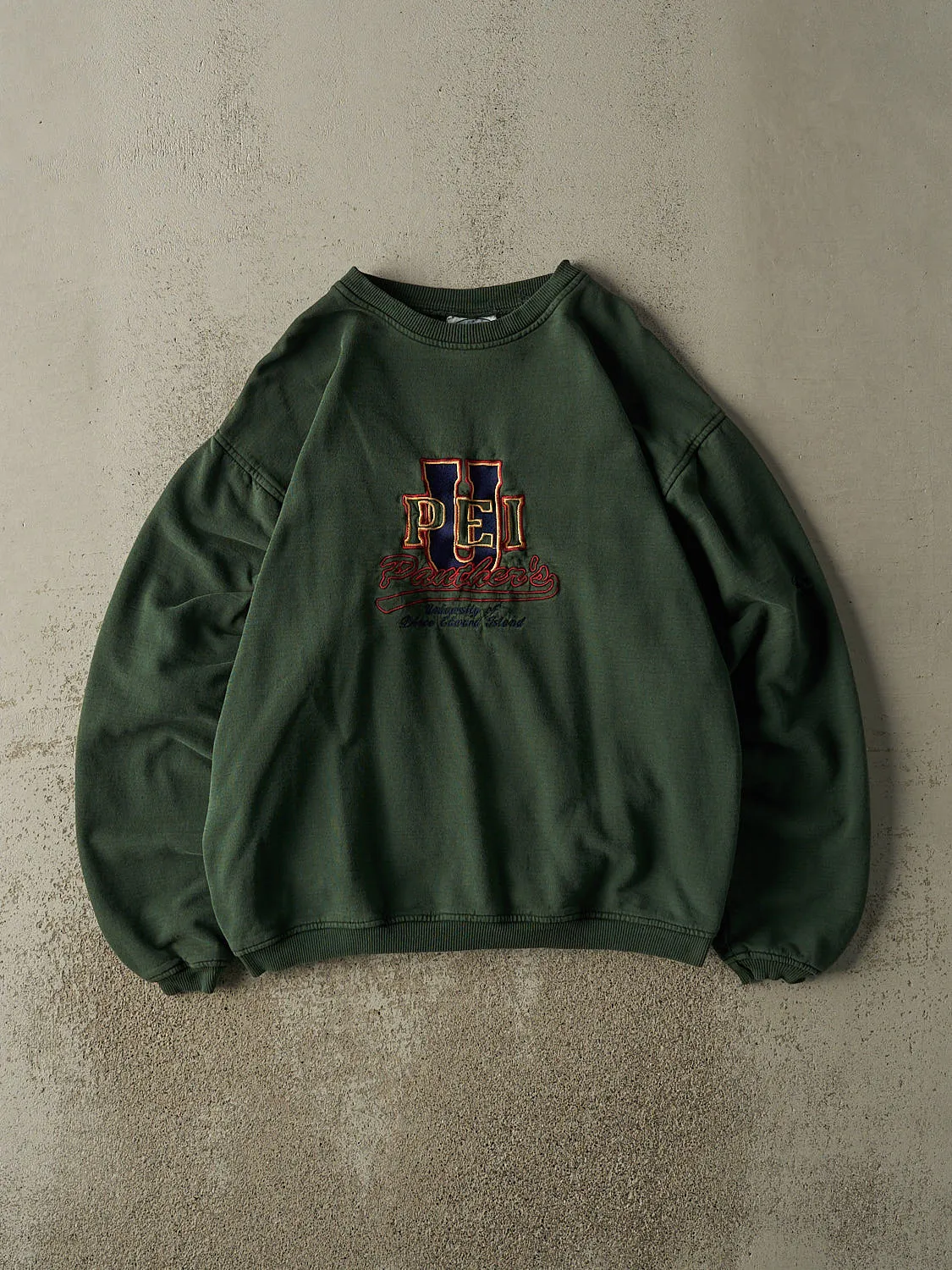 Vintage 90s Sun Faded Green University of Prince Edward Island Embroidered Crewneck (L/XL) sold by Rebalance Vintage
