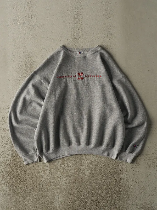 Vintage 90s Grey University of Nebraska Cornhuskers Embroidered Crewneck (M/L) sold by Rebalance Vintage