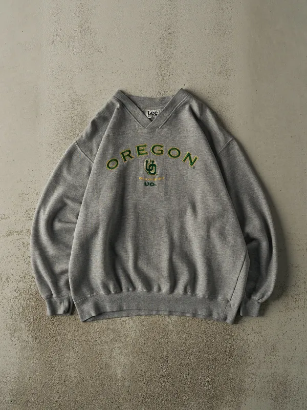 Vintage 90s Grey University of Oregon Ducks Embroidered Crewneck (L/XL) sold by Rebalance Vintage
