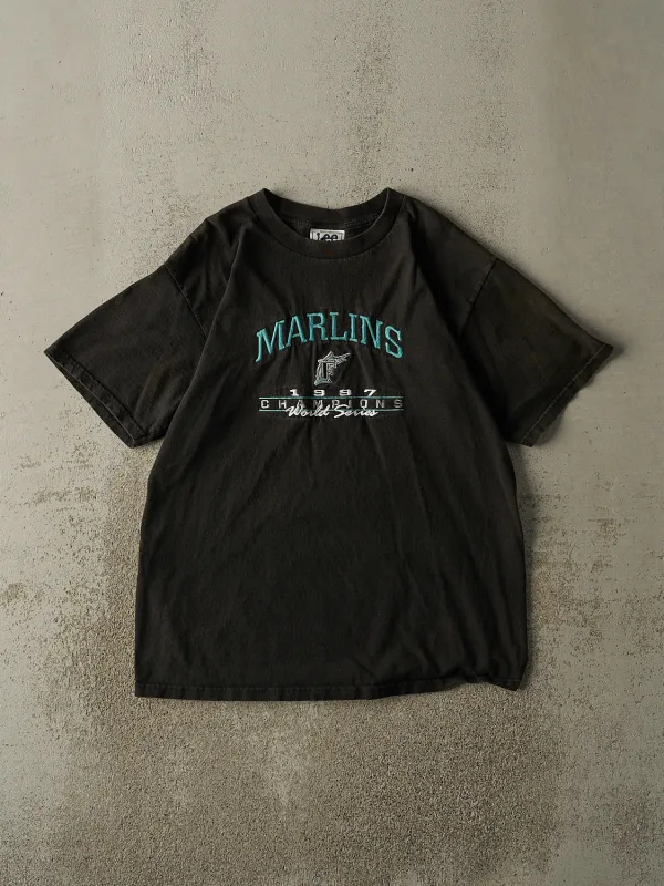Vintage 97' Faded Black Florida Marlins World Series Champions Embroidered Tee (L) sold by Rebalance Vintage
