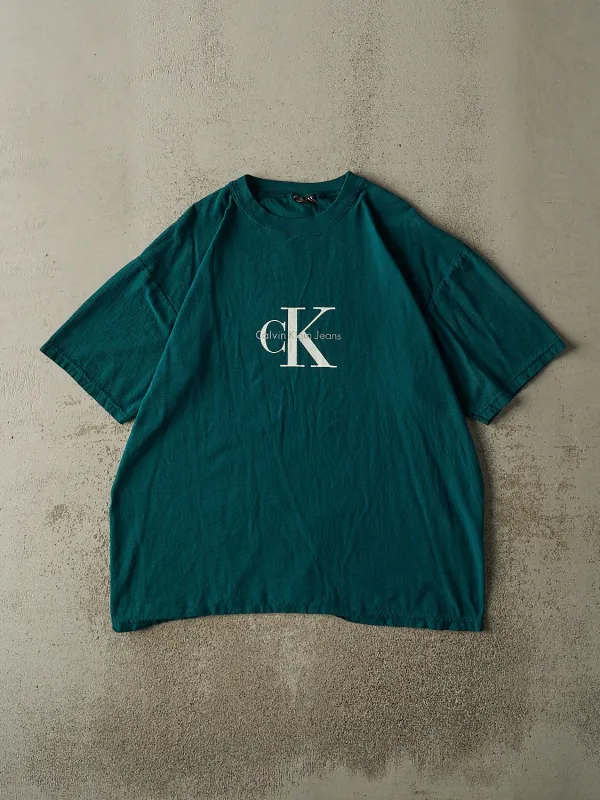 Vintage 90s Teal Calvin Klein Jeans Tee (XL/XXL) sold by Rebalance Vintage
