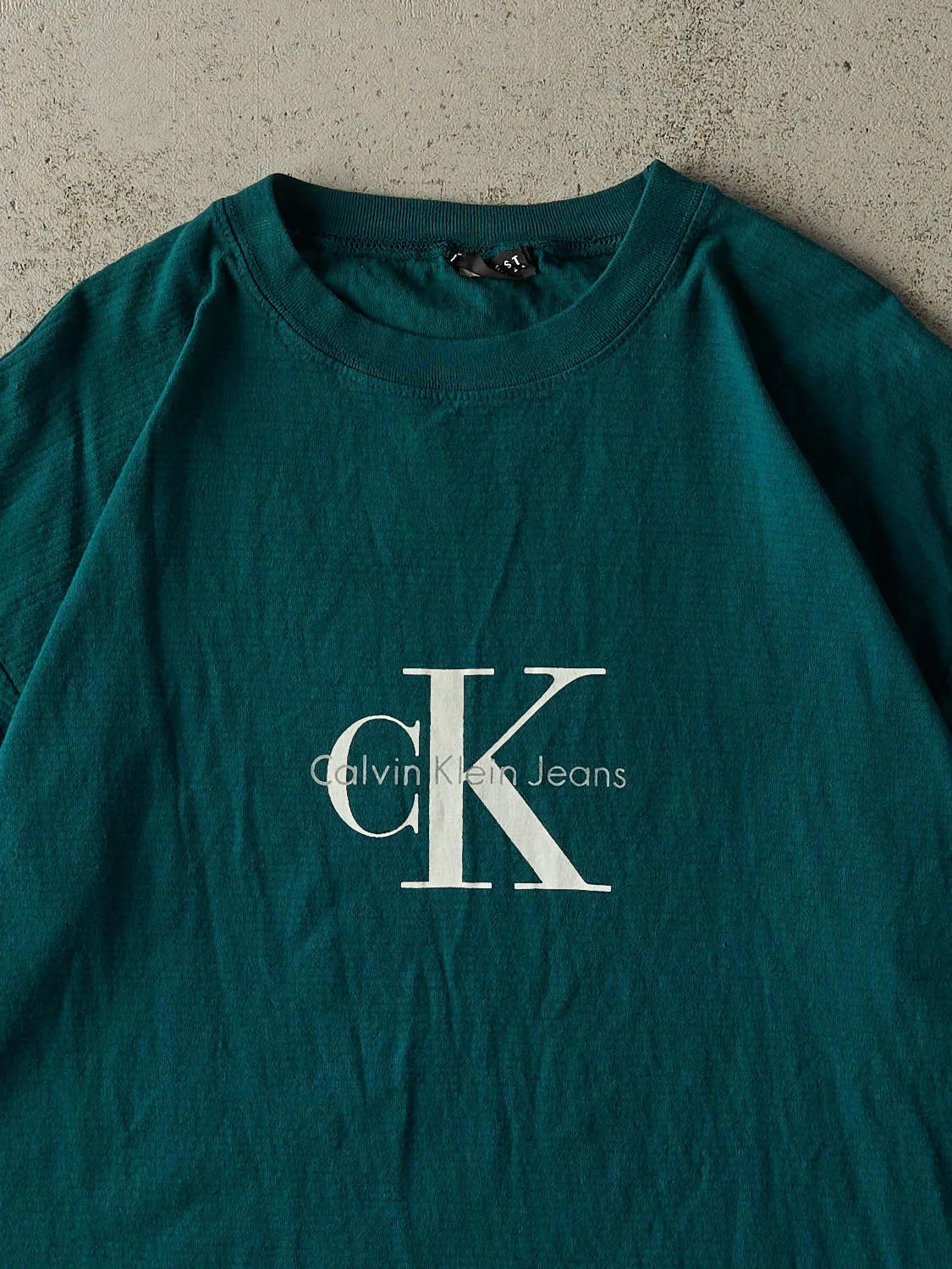 Vintage 90s Teal Calvin Klein Jeans Tee (XL/XXL) sold by Rebalance Vintage product image thumbnail 2