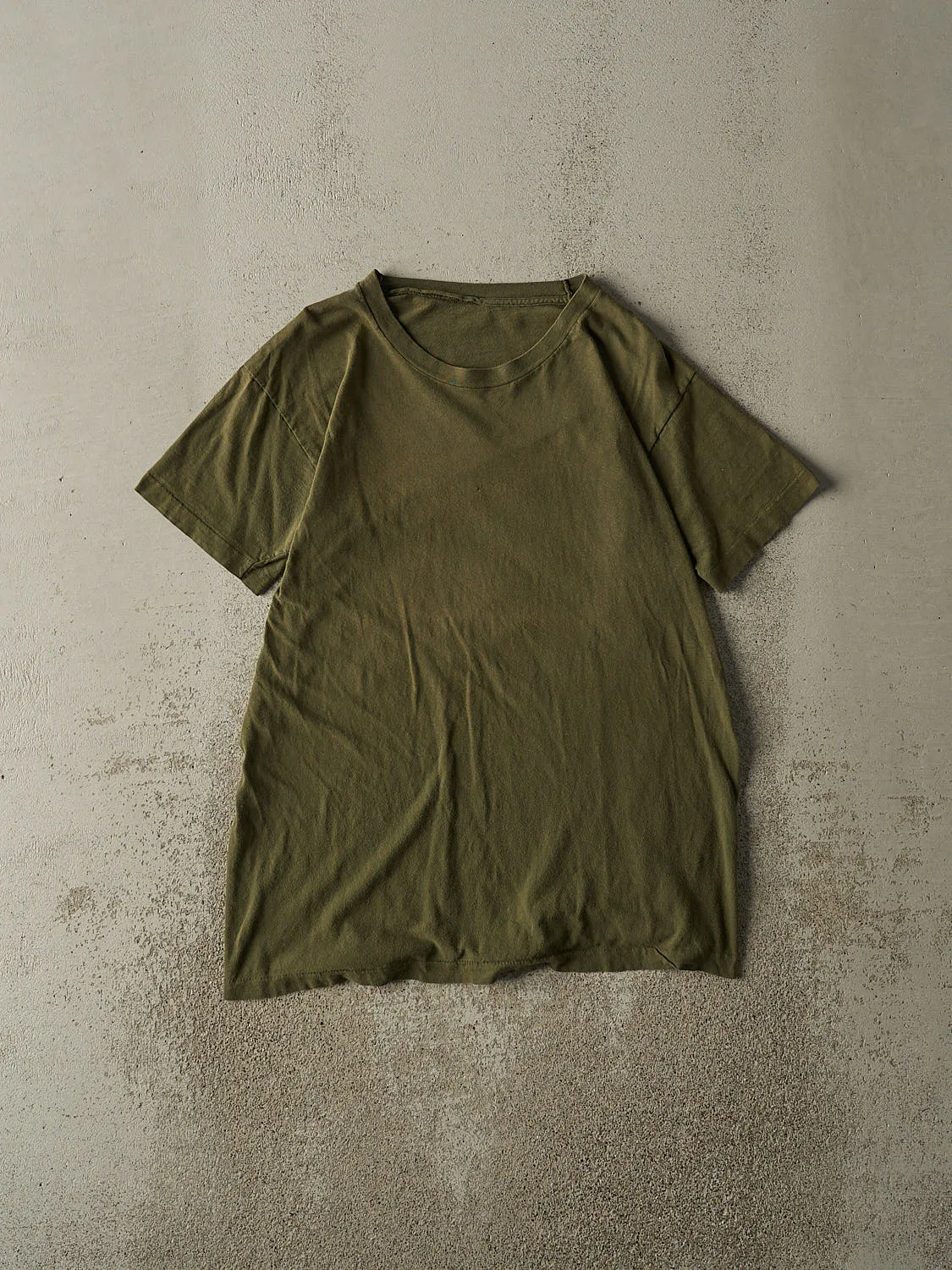 Vintage 90s Sun Faded Green Blank Single Stitch Tee (M/L) sold by Rebalance Vintage