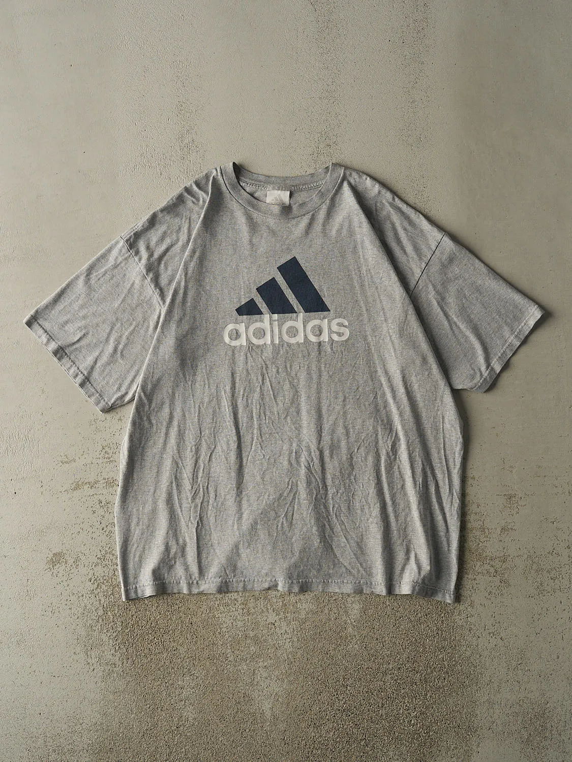 Vintage 90s Grey Adidas Logo Tee (XXL) sold by Rebalance Vintage