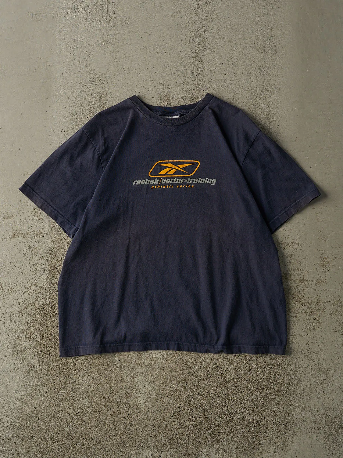 Vintage Y2K Navy Blue Reebok Tee (L/XL) sold by Rebalance Vintage