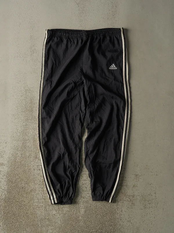 Vintage 90s Black Adidas Striped Track Pants (34x27) sold by Rebalance Vintage